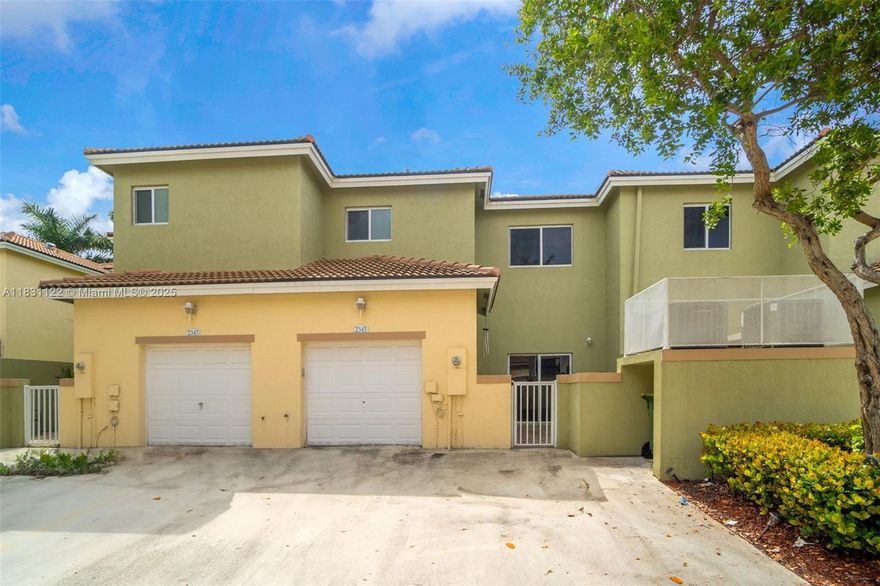 Best priced 4 bedroom 3 bathroom home in the area! Updated with tile floors throughout! This spacious townhouse come with a garage and is in a gated community with security patrol. This well-maintained home comes with impact windows and offers a generous layout. Water treatment system included! The first floor features ample living and dining space that opens to a private patio in the rear of the property, perfect for gatherings or relaxing outdoors. Upstairs, enjoy a private balcony and well-sized bedrooms. Just steps from the clubhouse pool, this home delivers community living at its best. Call with any questions, it's easy to show!