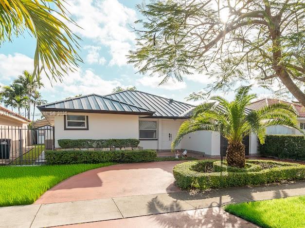 Welcome to 881 NW 133rd Ave, Miami, FL 33182 – a beautifully maintained home featuring recent upgrades that elevate its appeal. This property boasts remodeled bathrooms that blend modern design with functionality, providing a fresh and elegant look. A brand-new metal roof, completed in 2023, adds durability and style, with all required permits properly secured for peace of mind. AC system is also brand new.
Nestled in a sought-after neighborhood, this home offers a perfect combination of comfort and location. Whether you’re looking for a family home or an investment property, this residence is move-in ready and designed to meet your needs. Don’t miss the opportunity to own this gem in the heart of Miami!