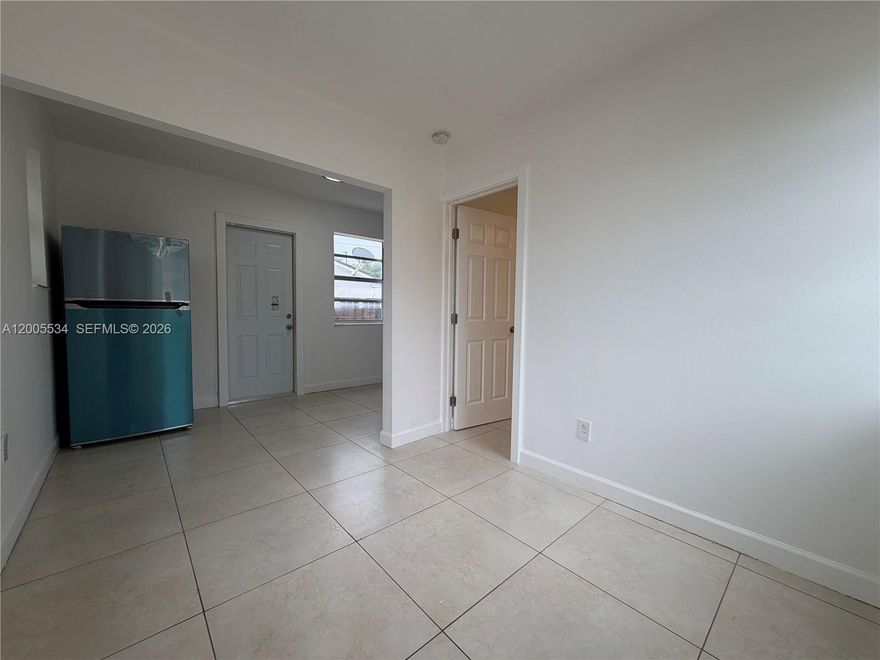 1BR/1BA duplex for rent. Features a cozy living space, small kitchen, and a private backyard. Perfect for singles or couples. No pets allowed.