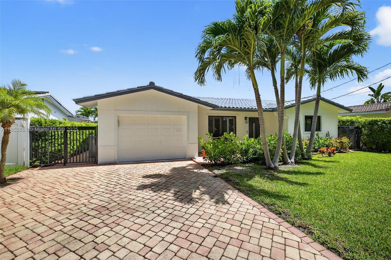 Over $130K in upgrades! Beautifully renovated 3BD/3BA waterfront home in Pompano Isles with no fixed bridges and 60' of water frontage, right by the Intracoastal. Move-in ready with impact windows/doors, new HVAC system, upgraded electric panels, PVC sewer line, and WiFi sprinkler system. Open layout with luxury flooring, updated kitchen with new Whirlpool appliances, and a bright living space leading to a large pool and 60’ dock with water, electricity, and a 22,000 lb boat lift for up to 40' vessels. Pool features new heater, pump, filter, PVC piping, and electric panel. East of Federal Hwy, minutes to beaches and the ocean. East of Federal Hwy, minutes to beaches and the ocean.