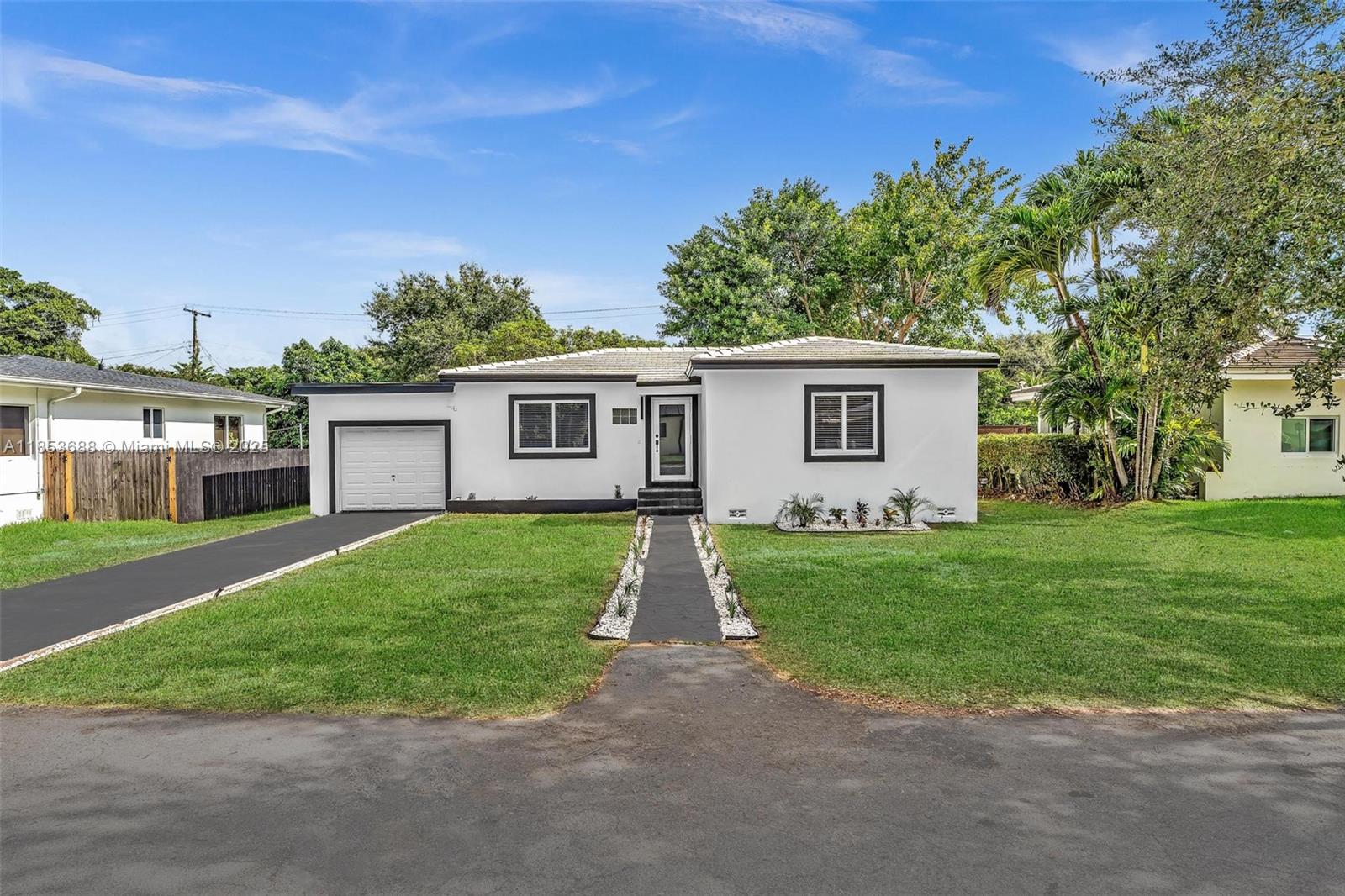 Stunning Fully Renovated 4-Bedroom, 2-Bath Home in the Heart of El Portal! This spacious home features a 2018 tile roof, impact windows and doors, and 2025 upgrades to electrical, plumbing, and tankless water heater.
elegant porcelain tile flooring, recessed lighting, and a modern open layout. kitchen boasts all-new cabinets, Quartz countertops, and premium Samsung stainless steel appliances. Both bathrooms fully remodeled, offering stylish finishes. Enjoy a bright family room and dining area. The attached 1-car garage offers flexibility and can easily be converted into a spacious primary suite or entertainment room. freshly painted inside and out, the home sits on a generous lot with a lush backyard featuring fruit-bearing trees—perfect for relaxing or entertaining.