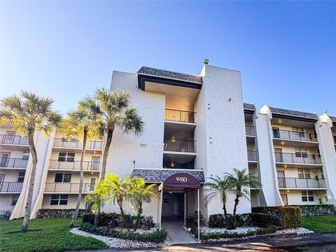 Photo of 9410 Poinciana Pl #405, Davie, FL 33324 (MLS # A11885234)