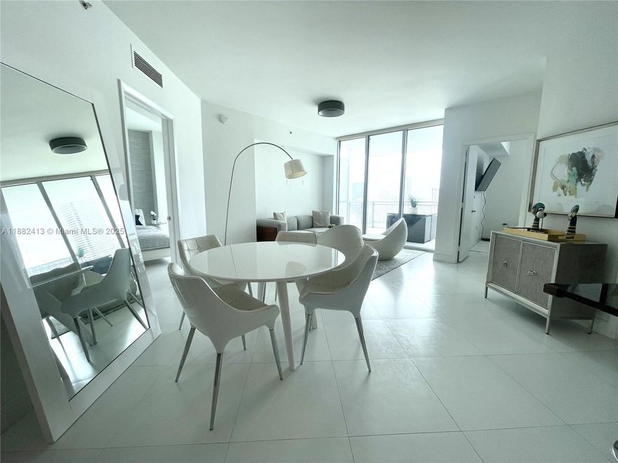 Modern PH residence, fully furnished, with stunning Miami skyline and bay views. This unit offers 2 bedrooms plus a versatile DEN, two balconies, and a walk-in closet. Located in the exclusive WIND, part of the prestigious Faena District—offering strong appreciation potential. Currently rented until May 6, 2026, with the lease fully assumable, ideal for investors. Residents enjoy five-star amenities: infinity pool, jacuzzi, sauna, steam room, gym, racquetball court, kids’ room, movie theater, Basic Internet and Cable. Impeccable HOA. Steps from Brickell City Centre and Metrorail, with direct I-95 access, minutes from Downtown, airport, Miami Beach, Coconut Grove, and Coral Gables. A perfect home or investment opportunity.
