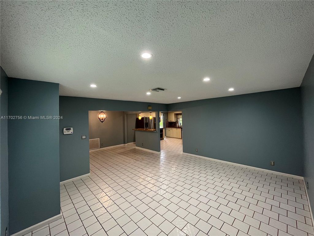 Photo of 11291 NW 39th Ct, Coral Springs, FL 33065 (MLS # A11702756)