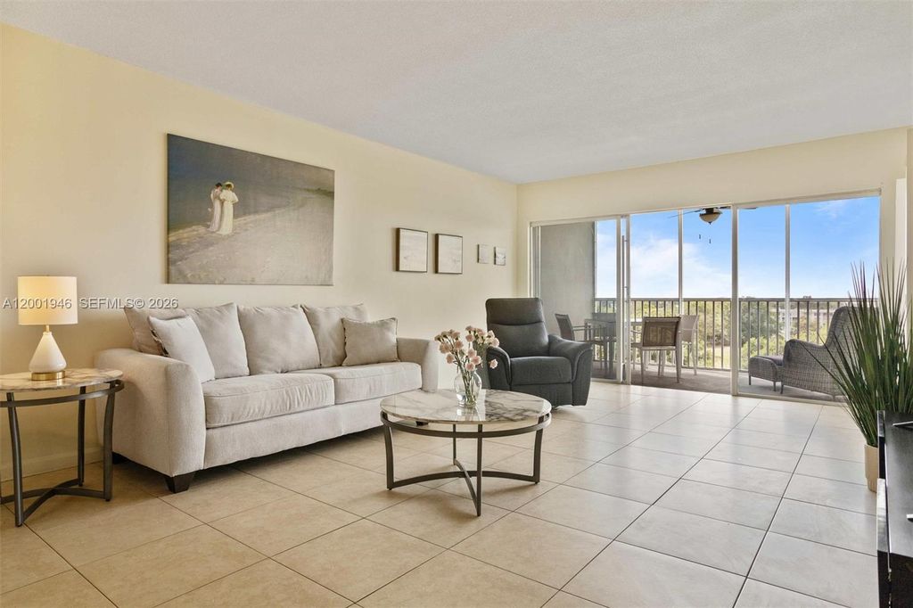 Photo of 3100 N Palm Aire Dr #703, Pompano Beach, FL 33069 (MLS # A12001946)