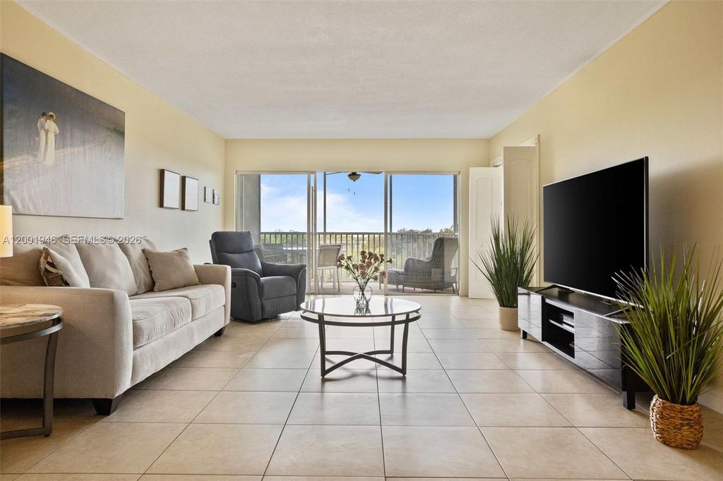 Photo of 3100 N Palm Aire Dr #703, Pompano Beach, FL 33069 (MLS # A12001946)