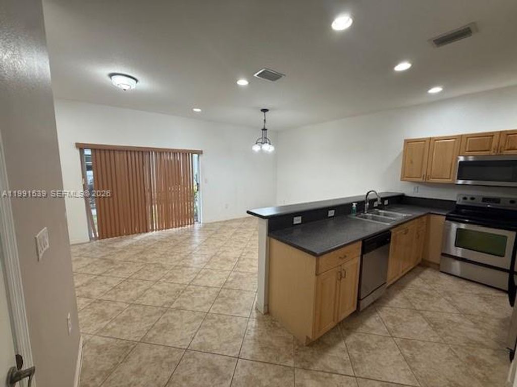 Photo of 4920 SW 140th Ter #4, Miramar, FL 33027 (MLS # A11991539)