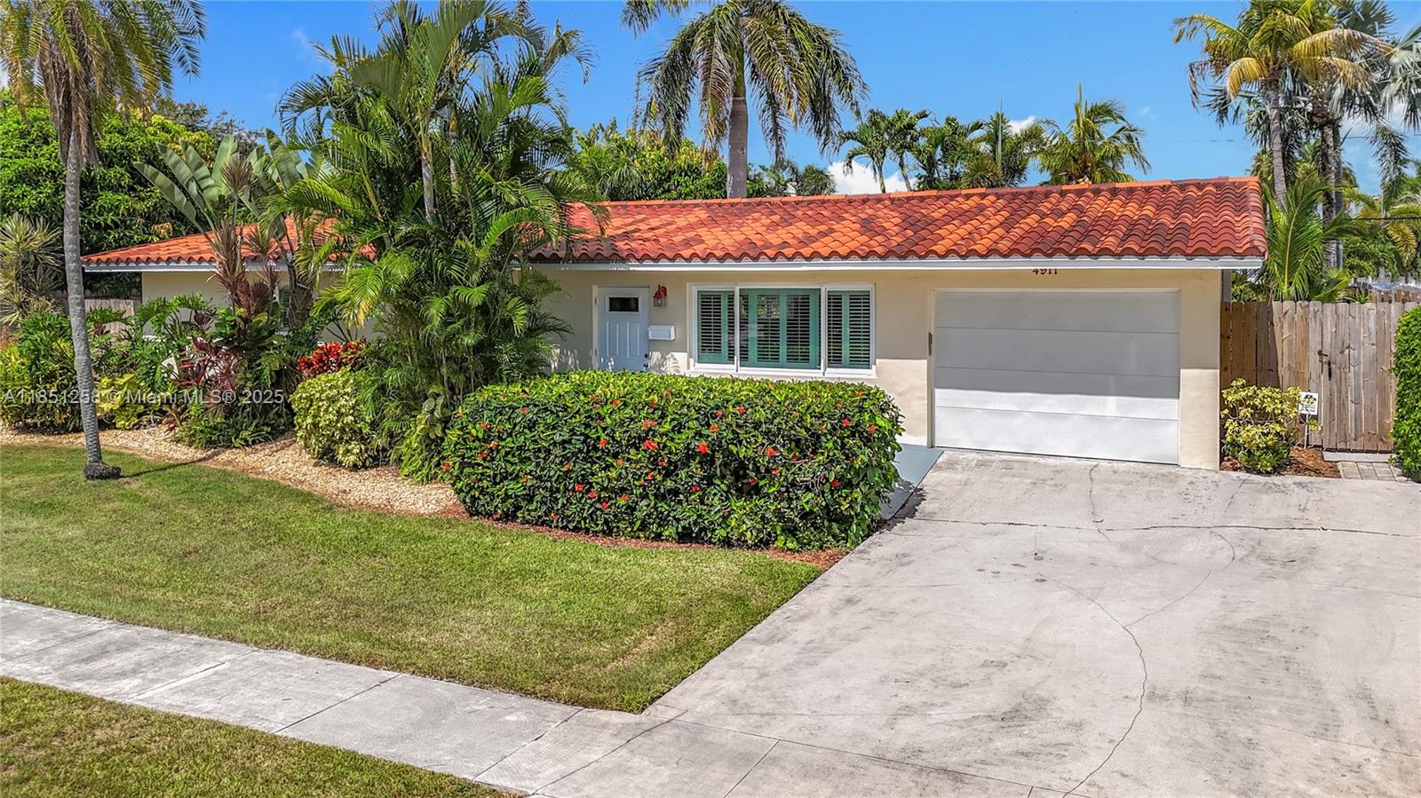Welcome to your private oasis in prestigious Lighthouse Point! This beautifully upgraded 3-bed, 2-bath home with 1-car garage blends coastal charm with modern elegance. Enjoy peace of mind with a concrete tile roof and full-impact windows/doors (2021). Inside, luxury vinyl flooring (2025) flows throughout, leading to a sunlit Florida Room and chef’s kitchen with wood cabinetry, granite counters, stainless appliances, and a bar-style island overlooking the lush, fenced backyard with tropical plants and fruit trees—perfect for entertaining. No HOA, but enjoy the nearby 6-acre Dan Witt Park featuring pickleball, volleyball, baseball, basketball, soccer, playgrounds, and more. Minutes to beaches, dining, and Intracoastal. Paradise awaits—schedule your tour today!