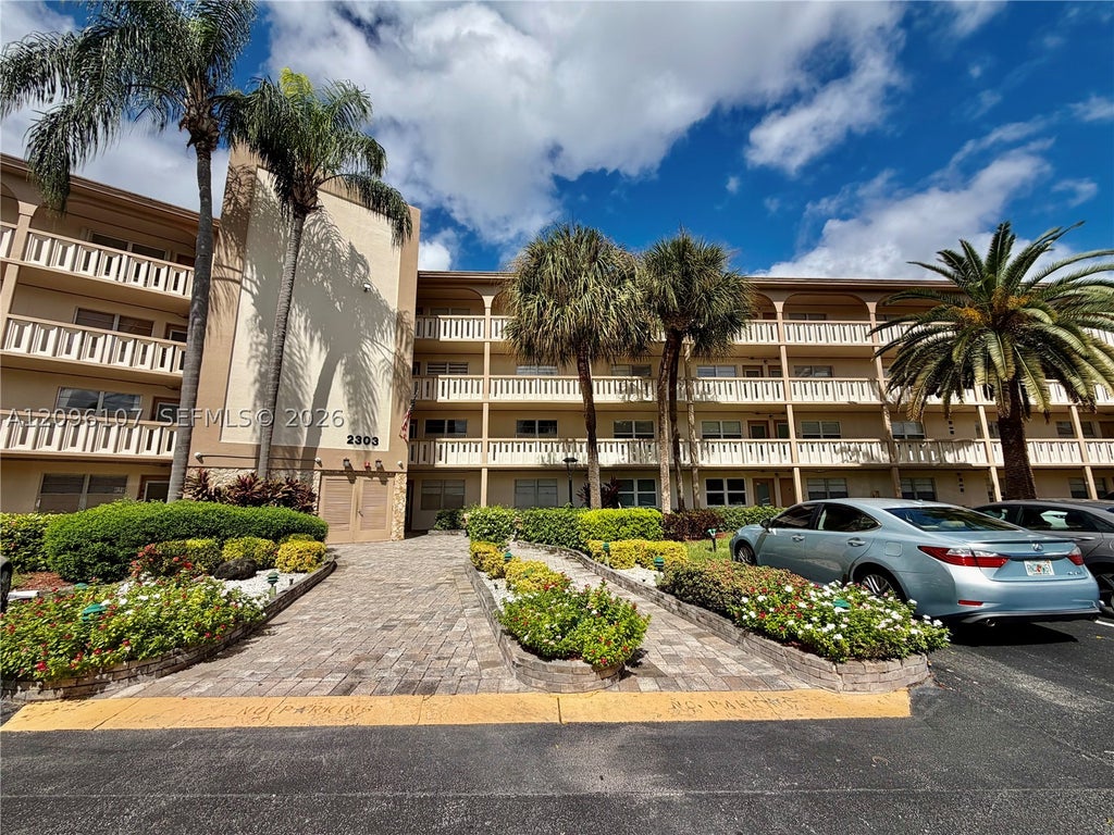 Photo of 2303 Lucaya Ln #C4, Coconut Creek, FL 33066 (MLS # A12096107)