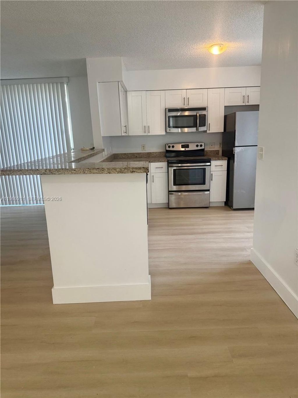 Photo of 12142 Saint Andrews Pl #112, Miramar, FL 33025 (MLS # A11989211)