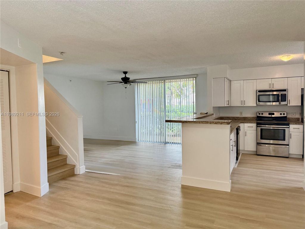 Photo of 12142 Saint Andrews Pl #112, Miramar, FL 33025 (MLS # A11989211)