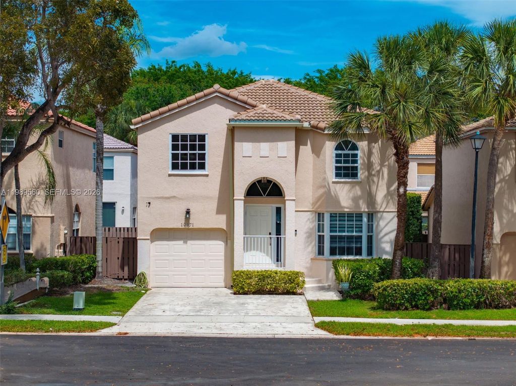 Photo of 10971 NW 12th Pl, Plantation, FL 33322 (MLS # A11989560)