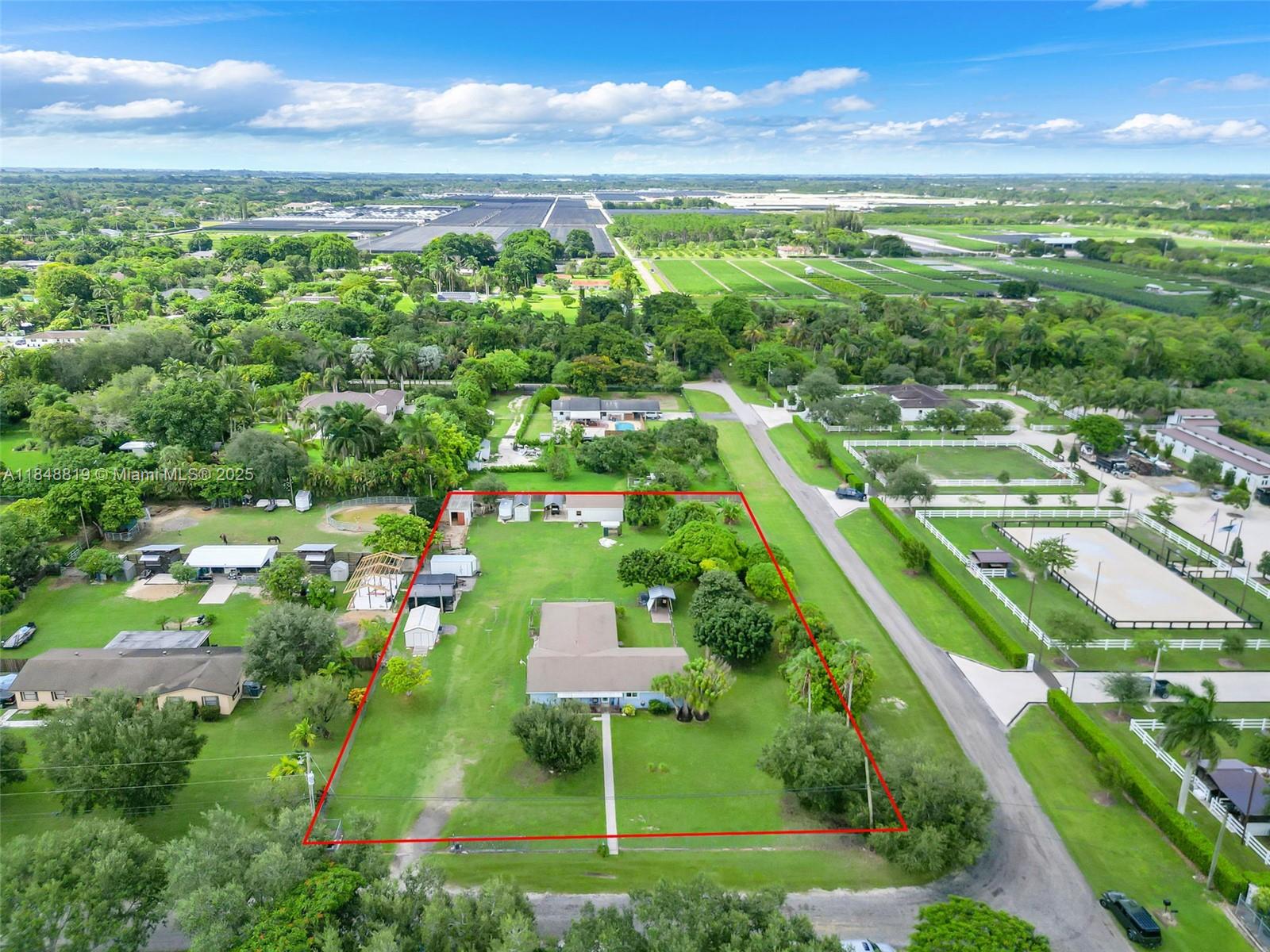 LIVE THE REDLAND AGRICULTURAL LIFESTYLE ON THIS 1.37 ACRE W/ A 4/2 HOME BUILT TO LAST GENERATIONS. SITTING ON A CORNER LOT, THE HOME HAS A SPLIT FLOORPLAN W/ VAULTED CEILINGS, HUGE KITCHEN W/ CUSTOM CABINETS & CENTER ISLAND THAT SITS A LG. FAMILY, 3 BEDROOMS W/ WOOD FLOORS, INLAW QTR'S ADJ. TO LAUNDRY ROOM, ALL INTERIOR WALLS & CEILINGS PLASTER, MOHAGANY INTERIOR DOORS & CROWN MOLDING/BASEBOARDS, NEW IMPACT FRONT DOOR, NEWER A/C UNITS & 7 IMPACT WINDOWS & DADE CNTY APP. SHUTTERS. SHE'S FULLY FENCED W/ ELECTRIC GATE. THE ACREAGE HAS BARN/PADDOCK & TACK ROOM, 20X30 INSULATED WORKSHOP, 12X20 SHED, CROSS FENCED AREA OFF OF BACK 1/2 WRAP PATIO, ASSORTED FRUIT TREE'S (MANGO, LYCHEE, LONGAN, BANANA, LOQUAT, BLACK SAPOLTE) & LIVE OAKS,SABLE & PONYTAIL PALMS. SEE ATTACHMENTS FOR SELLER DETAILS.