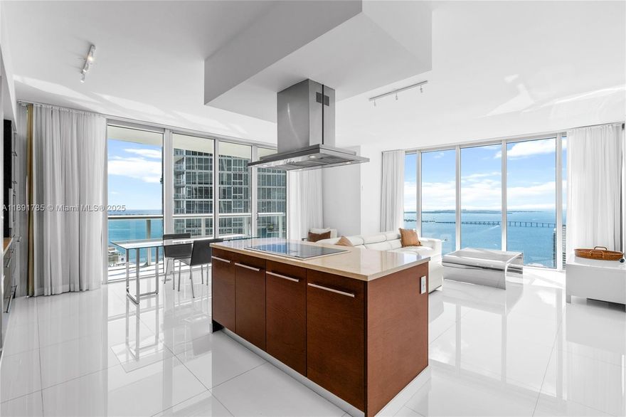 The only tower at Icon Brickell that allows daily rentals—making it the ultimate short-term investment in Brickell! This high-floor corner unit features stunning views of the Bay, pool, and city skyline, brand-new renovated bathrooms, an open kitchen, split bedrooms, and floor-to-ceiling windows with balcony access. Enjoy world-class amenities: a double Olympic pool, oversized jacuzzi, luxurious spa with cold plunge, steam and sauna rooms, state-of-the-art gym with free classes, plus restaurants, cafes and poolside service.