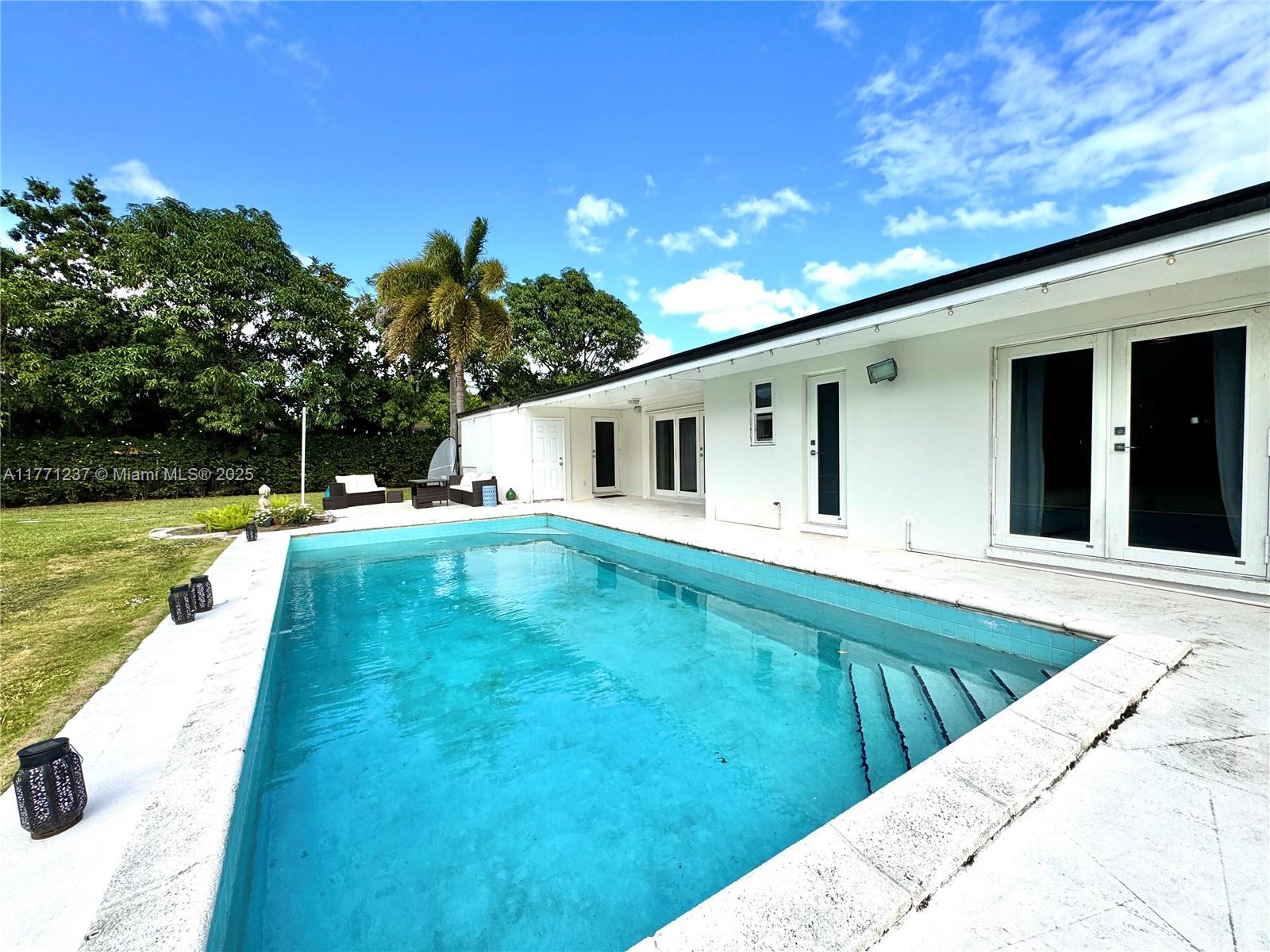 Fully Furnished, discover the perfect Home with a private Pool in Prime Miami location, 3-bedroom, 2-bathroom home nestled in a quiet cul-de-sac. plus a multipurpose space, can be used as another bedroom, office, tv room. Home with Private Pool in Prime Miami Location.Offering 3,904 sqft of interior space, including a versatile room ideal for an office or playroom, this property is designed for comfort and convenience. Enjoy the privacy of a spectacular backyard with a private pool, plus parking for up to three vehicles. The rent includes water, electricity, landscaping, and garbage services. Centrally located, you're just minutes from Miami International Airport, Dadeland Mall, and Coral Gables. Perfect for families or professionals seeking a premium Miami lifestyle!