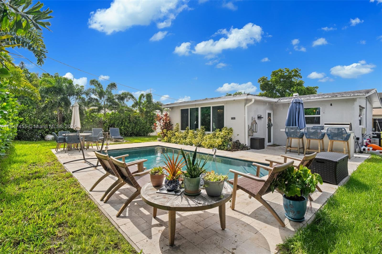 Welcome to your South Florida oasis! This beautifully updated 2/2 home is located just minutes from the Hard Rock Hotel & Casino, offering the perfect blend of comfort, style, and convenience. Step inside to discover a renovated kitchen w/ modern finish, stainless steel appliances, & sleek cabinetry. The home also features a fully upgraded bathroom and new A/C. And new impact windows, doors, & garage door for peace of mind and energy efficiency. Enjoy true Florida living in your tropical backyard retreat, complete with a new pool, landscaping, and ample space for entertaining. Plus, solar panels to keep energy costs low. No HOA. Location, lifestyle, and luxury updates—this home checks all the boxes.