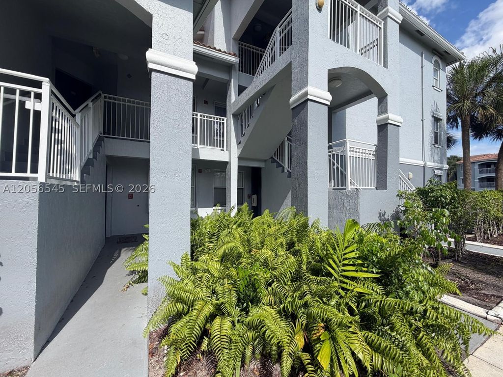 Photo of 9645 NW 1st Ct #1-110, Pembroke Pines, FL 33024 (MLS # A12056545)
