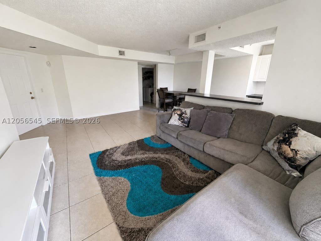 Photo of 9645 NW 1st Ct #1-110, Pembroke Pines, FL 33024 (MLS # A12056545)
