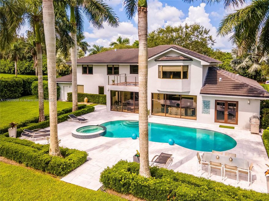 Welcome to this exquisite home in a small, secluded, well-established private gated community, located on a private street. This property offers convenience & tranquility. It sits on a builder’s acre, close to major highways & airports. Available fully or partially furnished starting December 1st. Enjoy a full surround sound music system, complete home water softener system, hurricane impact windows & doors, home gym & a convertible home office. The large open kitchen features high-end appliances, including Wolf, Subzero & others. Relax in the newly remodeled pool/spa. The private downstairs bedroom with a full bath is perfect for in-law quarters. The master suite boasts a private balcony, & the second floor offers a split floor plan.