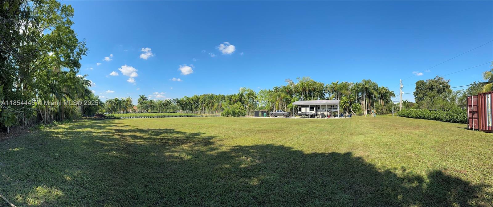 Property includes water, septic, electric service, and two wells. Features a 50 amp RV hookup, 40 ft shipping container, and a 35 ft metal roof structure on gravel foundation. Entire lot is secured with fencing and surrounded by lush, mature trees, adding privacy and natural beauty.
Zoned Agricultural and Residential, offering multiple use options for a custom home, agricultural development, or both. Currently leased to an operating nursery, providing immediate rental income. An agricultural exemption is in place, significantly lowering property taxes. No HOA. Cleared and ready for use.
Excellent opportunity for investors, nurseries, or those seeking rural living with infrastructure already in place.