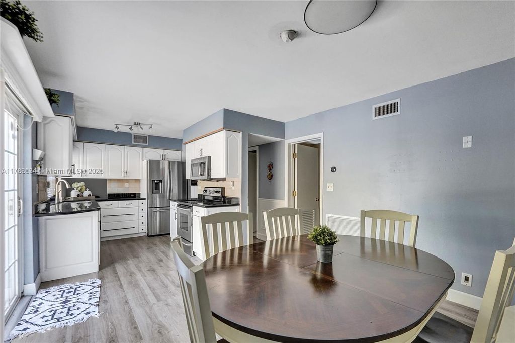 Photo of 3753 NW 73rd Way, Coral Springs, FL 33065 (MLS # A11783534)