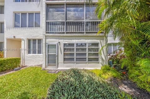Photo of 6750 Royal Palm Blvd #106E, Margate, FL 33063 (MLS # A12071704)
