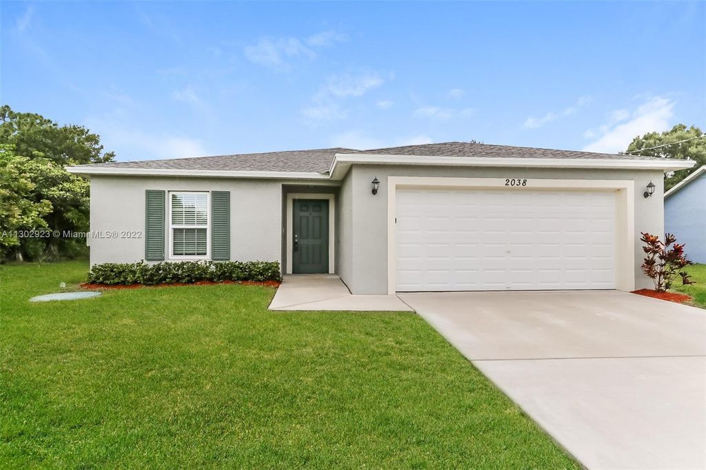 Photo of 2038 SW Aladdin St, Port Saint Lucie, FL 34953 (MLS # A11302923)