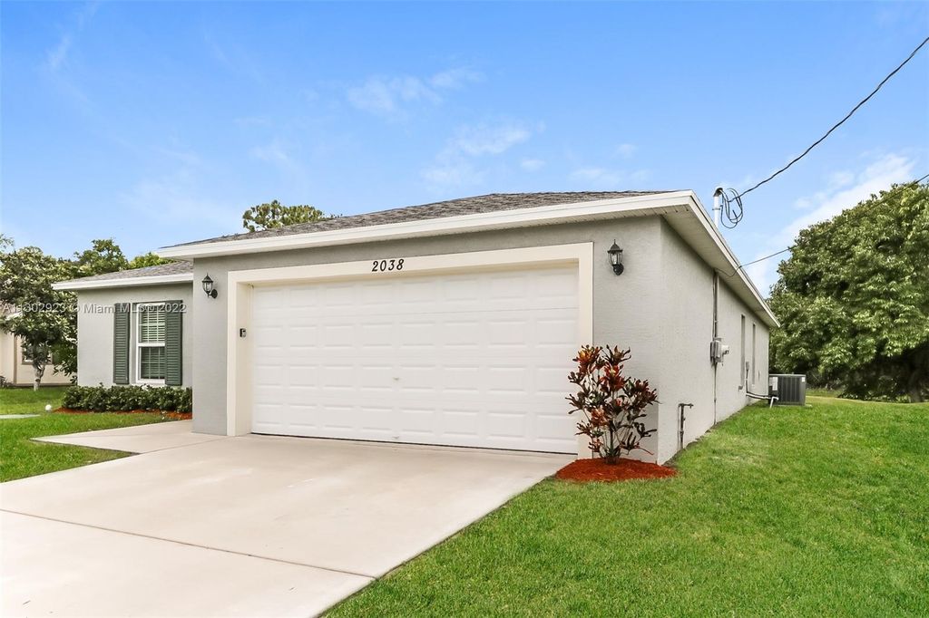 Photo of 2038 SW Aladdin St, Port Saint Lucie, FL 34953 (MLS # A11302923)