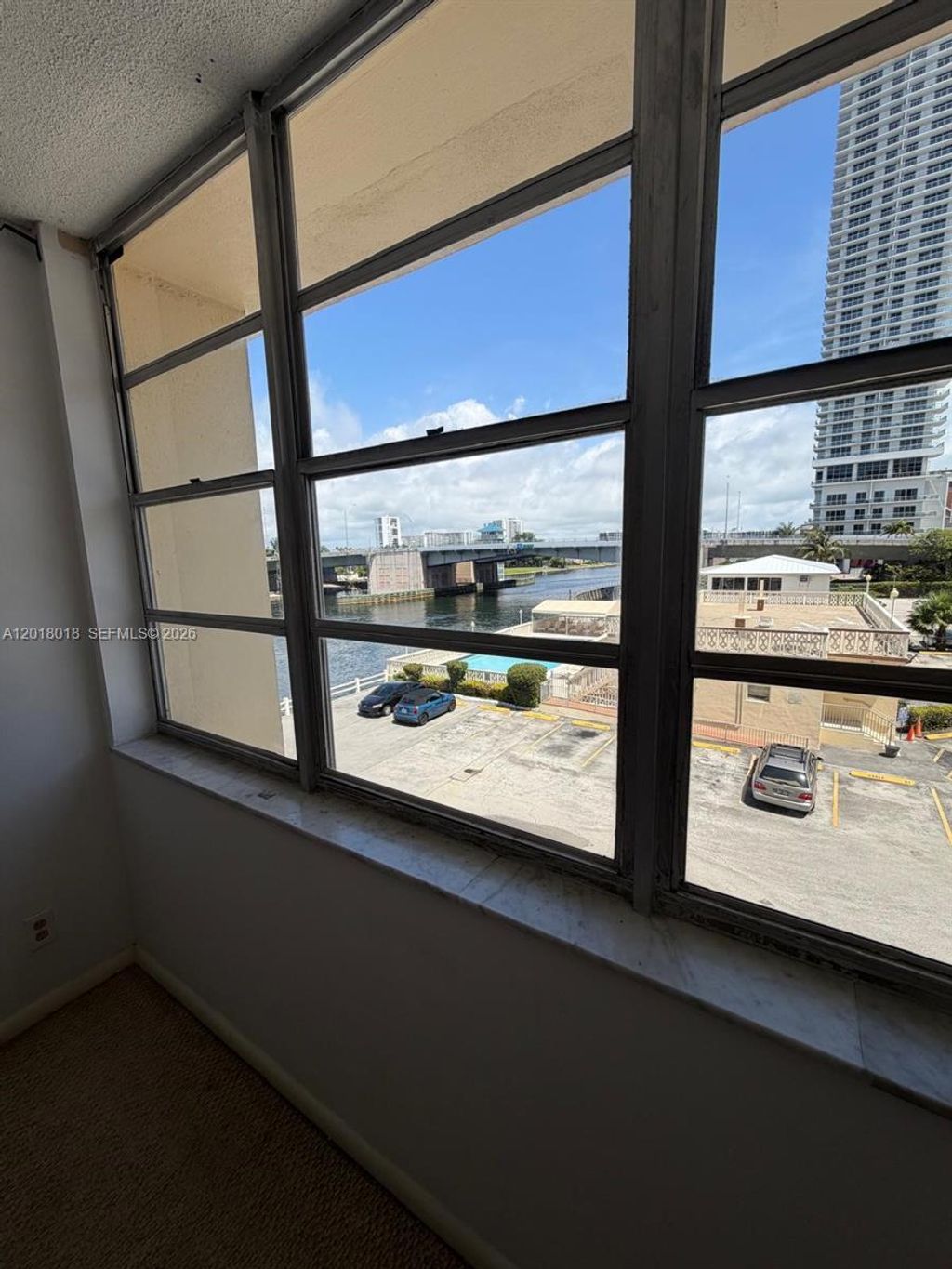 Photo of 1817 S Ocean Dr #319, Hallandale Beach, FL 33009 (MLS # A12018018)