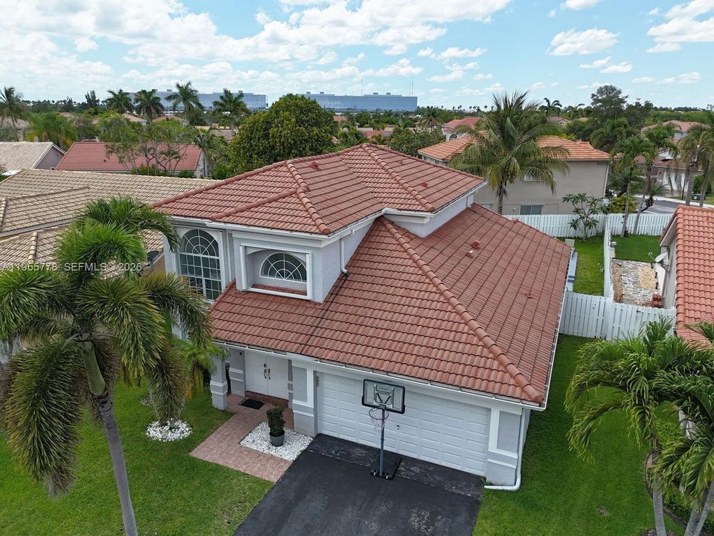 Photo of 1421 NW 129th Ave, Sunrise, FL 33323 (MLS # A11955778)