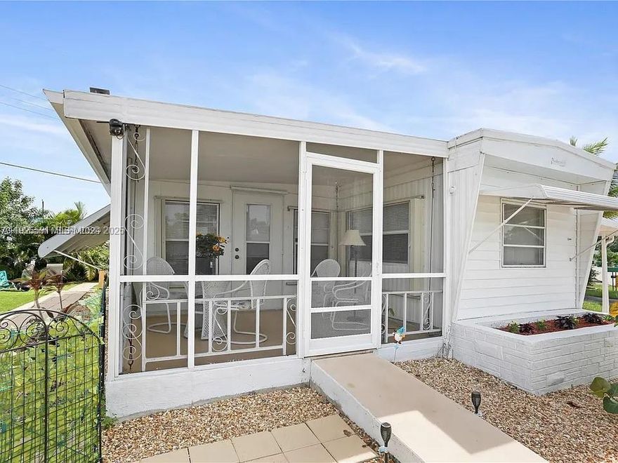 Charming, fully furnished 3BD/2BA home in the lovely 55+ community of Park City in Davie. Spacious living and dining areas, in-unit washer/dryer, central A/C, and artificial turf yard with screened front porch. Covered carport fits 2 cars. Located across from clubhouse with pool and putting green. Close to highways, shopping, airport, and hospital. At least one tenant must be 55+; no residents under 18. Low HOA makes this gem even more appealing