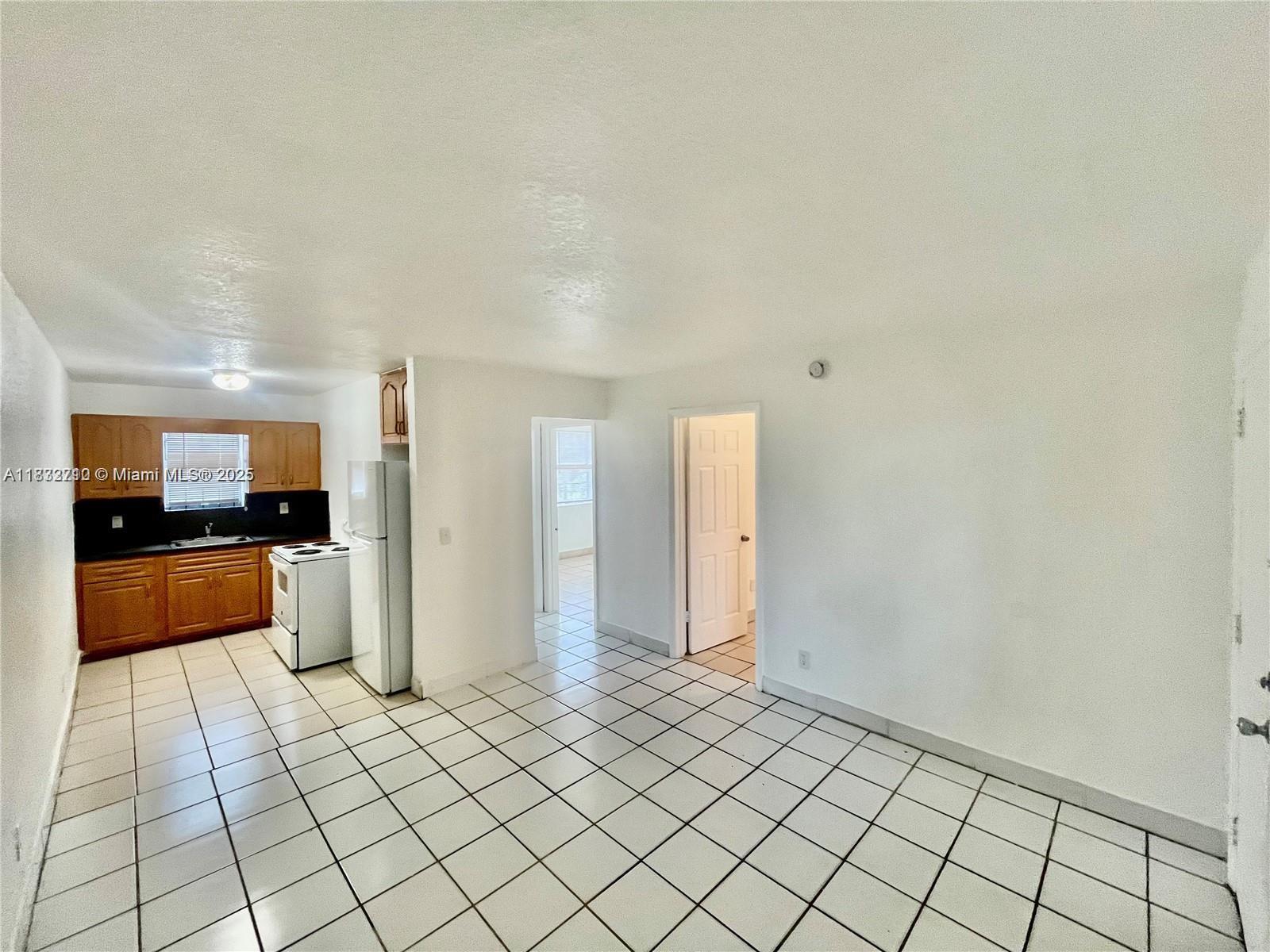 Discover a charming, spacious two bedroom, one bathroom apartment on the ground floor, brand new a/c units in all rooms, recently painted and ready for immediate move-in. There's no HOA and the approval process is swift, plus water is included in the rent.