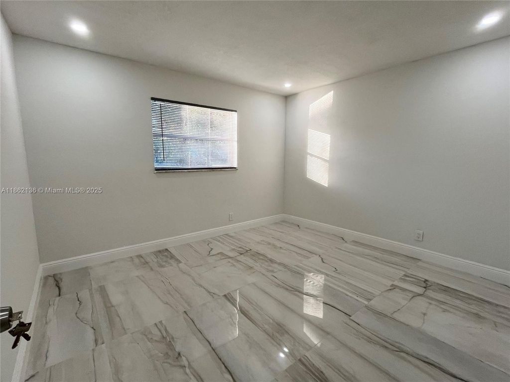 Photo of 8011 NW 44th Ct #1, Coral Springs, FL 33065 (MLS # A11862136)