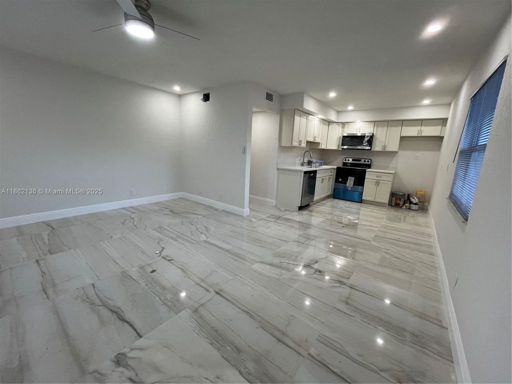 Photo of 8011 NW 44th Ct #1, Coral Springs, FL 33065 (MLS # A11862136)