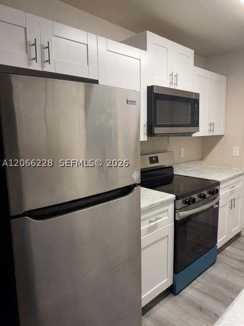 Photo of 1417 NW 7th Ave #1-2, Fort Lauderdale, FL 33311 (MLS # A12066228)