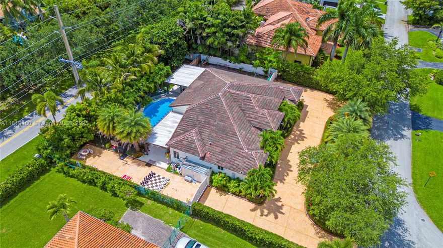 Step into timeless elegance at this meticulously remodeled residence, where high design meets relaxed Florida living. Situated on a generous 15,000 sq. lot in one of Palmetto Bay's most exclusive enclaves, this home offers curated interiors, soaring vaulted ceilings, and bespoke finishes throughout.
The chef's kitchen is a masterpiece crafted with sleek quartz countertops, custom cabinetry, and premium appliances. Spacious living areas flow effortlessly into the backyard oasis, where a sparkling pool, custom-built pergola, and fully outfitted outdoor kitchen set the stage for unforgettable entertaining.
Whether you're hosting under the stars or enjoying quiet moments in your private retreat, this home offers a rare blend of sophistication, comfort, and lifestyle.