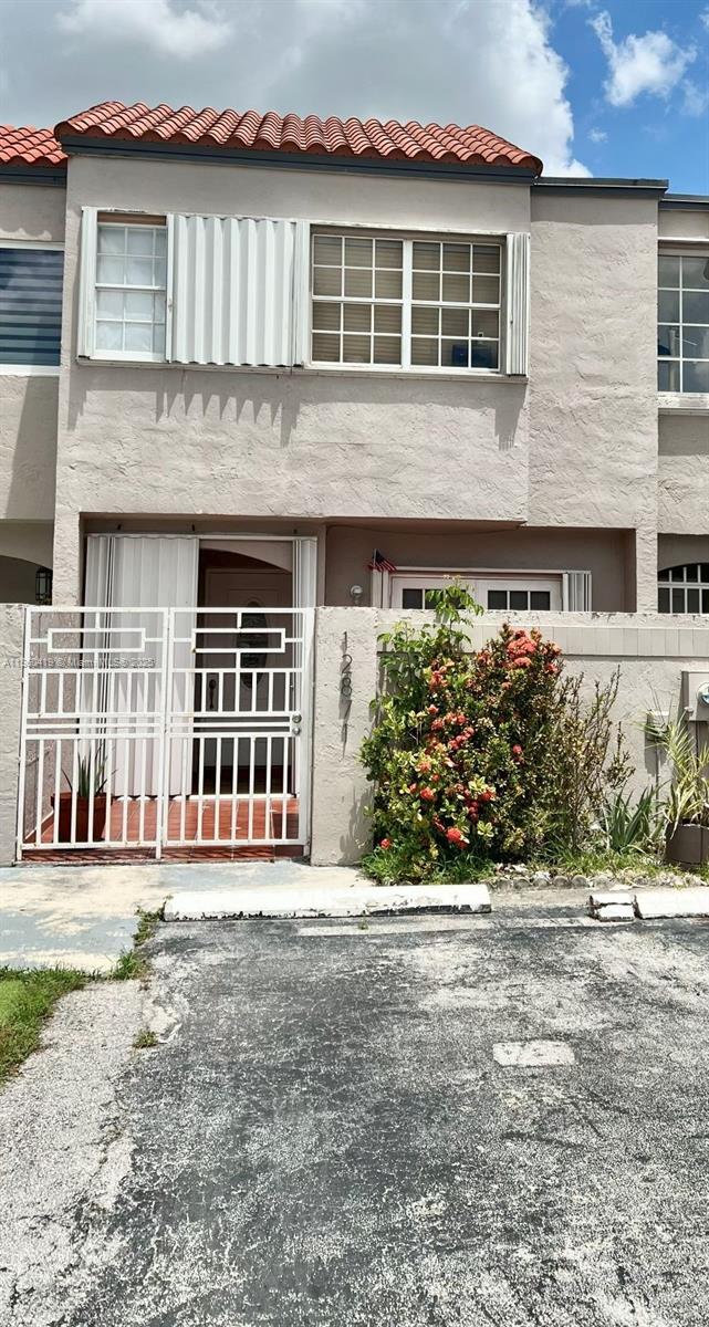 Great 2/2.5 Townhouse w/2 parking spots. 2 Patios, hurricane shutters, fully tiled bathrooms in excellent condition. Roof and A/c is about 7 to 8 years old. Washer/dryer in unit. Spacious kitchen and a great living room area. This is the perfect unit for a family or an investor. Property can be sold FHA , VA, Conventional or cash. Come by and see your new home.