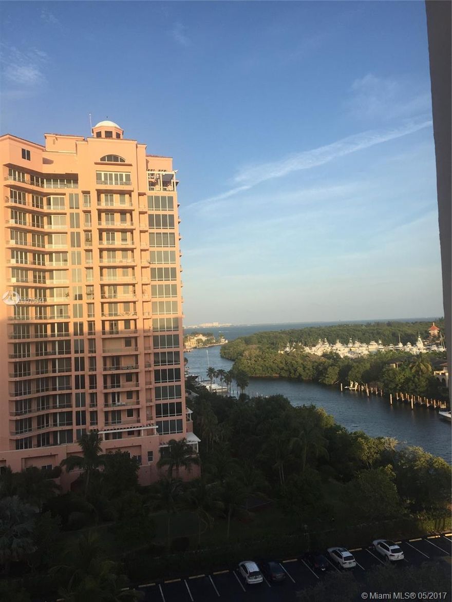 Contemporary minimalism reigns in this fabulous updated 1/1.5 unit with only one neighbor and spectacular views of the Gables waterways & city skyline.  Freshly painted and featuring new porcelain tiles, baseboards, new kitchen with quartz countertops and stainless appliances, & updated baths. Spectacular building maintenance team! Full 24 hr  concierge, heated pool, gym, party room, billiard room, laundry facilities in every floor, and valet parking! All common areas will be updated commencing this summer 2017!