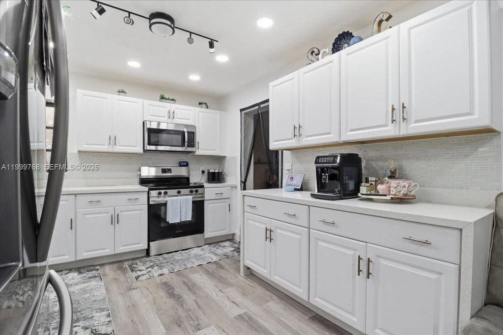 Photo of 7551 Polk St, Hollywood, FL 33024 (MLS # A11999768)