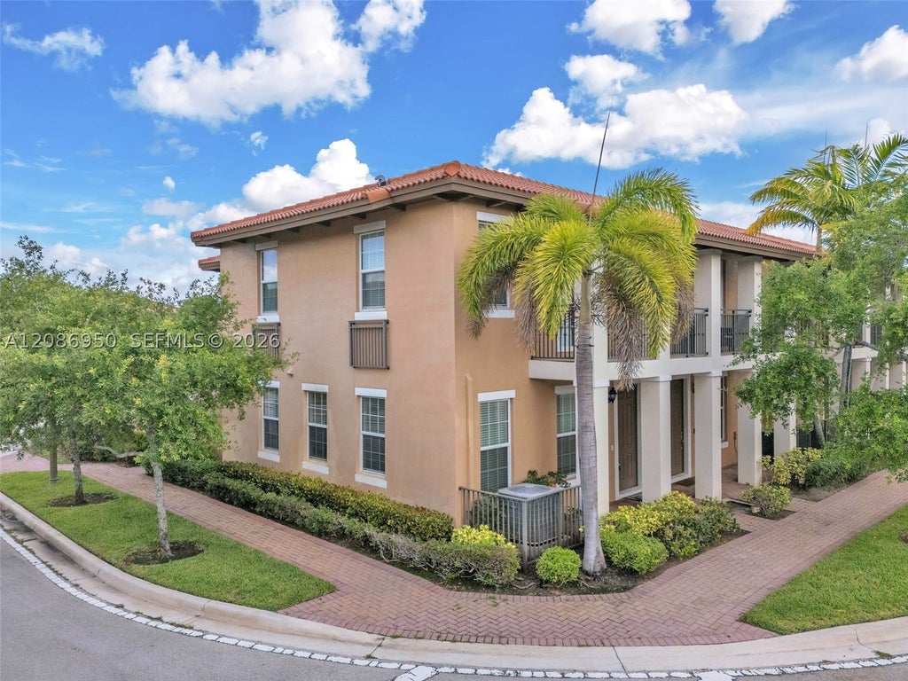 Photo of 1148 SW 147th Ave #1148, Pembroke Pines, FL 33027 (MLS # A12086950)
