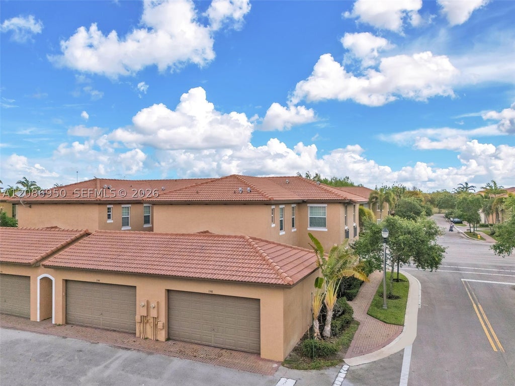 Photo of 1148 SW 147th Ave #1148, Pembroke Pines, FL 33027 (MLS # A12086950)