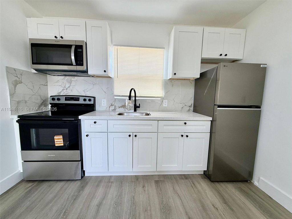 Photo of 1845 Dixieanna St #1, Hollywood, FL 33020 (MLS # A11948115)