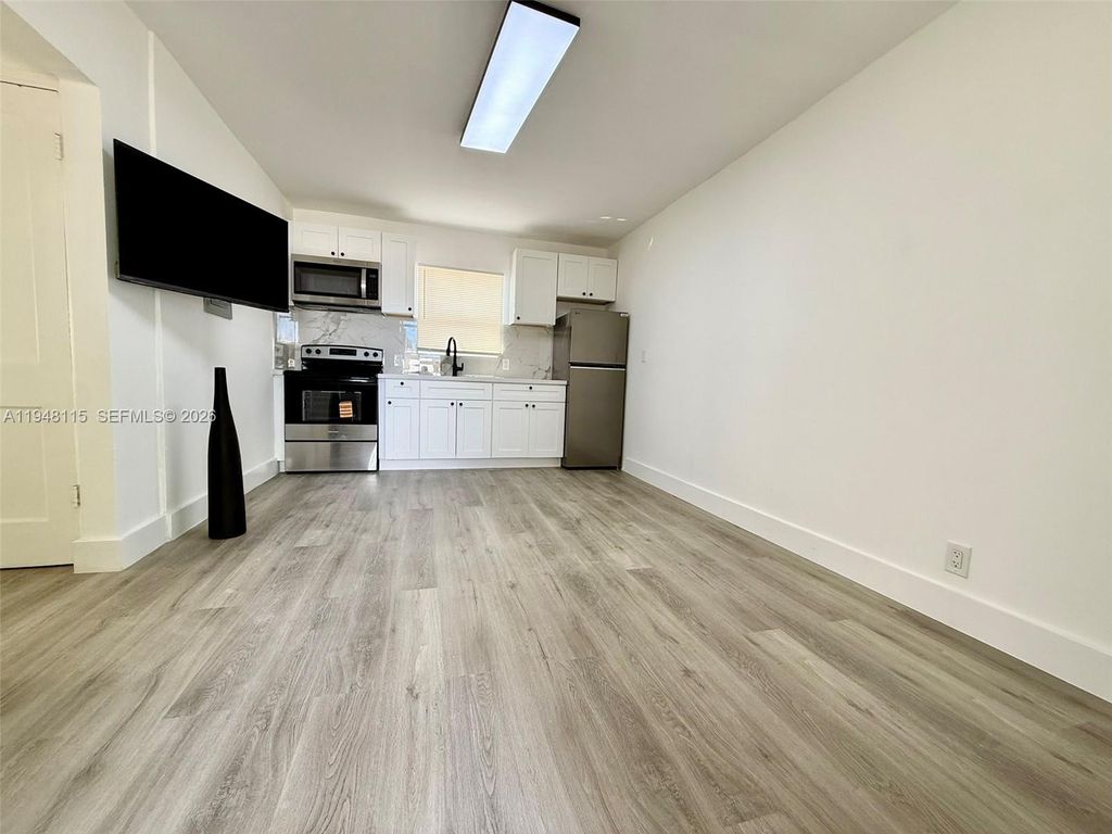 Photo of 1845 Dixieanna St #1, Hollywood, FL 33020 (MLS # A11948115)