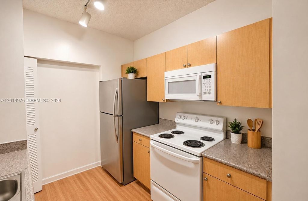 Photo of 1919 Van Buren St #115A, Hollywood, FL 33020 (MLS # A12016975)