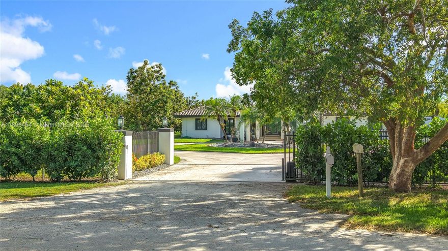 Nestled within 5 lush acres of privacy and agricultural charm, this bespoke estate features a beautifully remodeled Mediterranean-style home, complete with 5 beds, 5 baths, and a guest house overlooking a screened-in pool oasis. With quartz counters, porcelain tiles, a full water softening & purification system, and an active avocado and mango grove, this property blends luxury, functionality, and investment potential. The guest house, with its own kitchen and bath, offers flexibility for visitors or rental income. Whether you’re seeking a private sanctuary or a multifunctional estate, this is a rare opportunity in Miami’s upper Redlands.