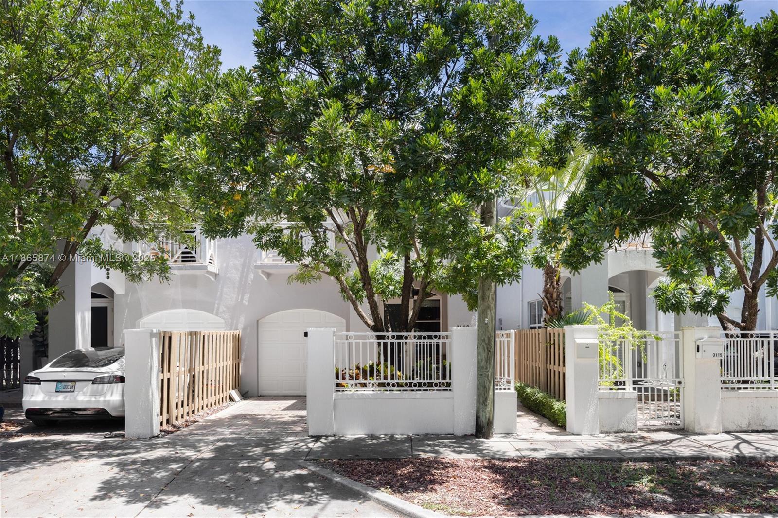 Key West–Style Townhome in Coconut Grove. Full of charm, with 3 bedrooms, 2.5 baths & den. Impact windows & doors, wood & marble floors, custom kitchen with wood cabinetry, granite counters & stainless steel appliances. French doors open to spacious patio, terraces & private pool. One-car garage plus driveway parking. Walk to shops, dining, parks & schools.