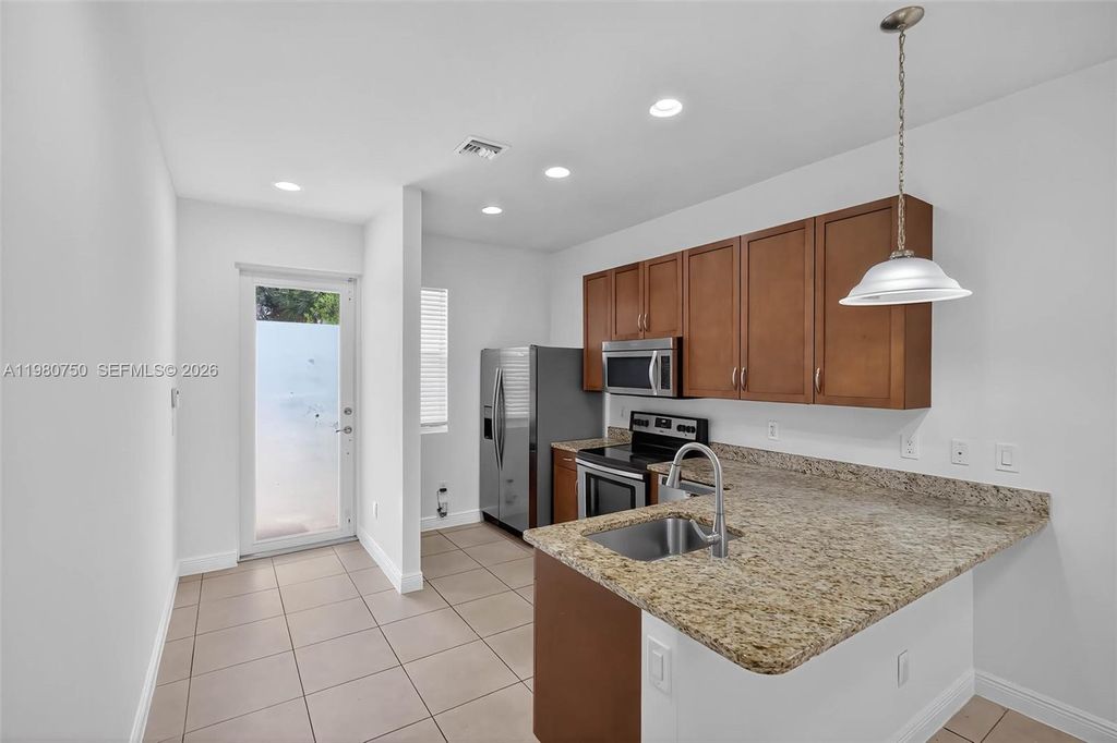 Photo of 7661 NW 88th Terrace #0, Tamarac, FL 33321 (MLS # A11980750)