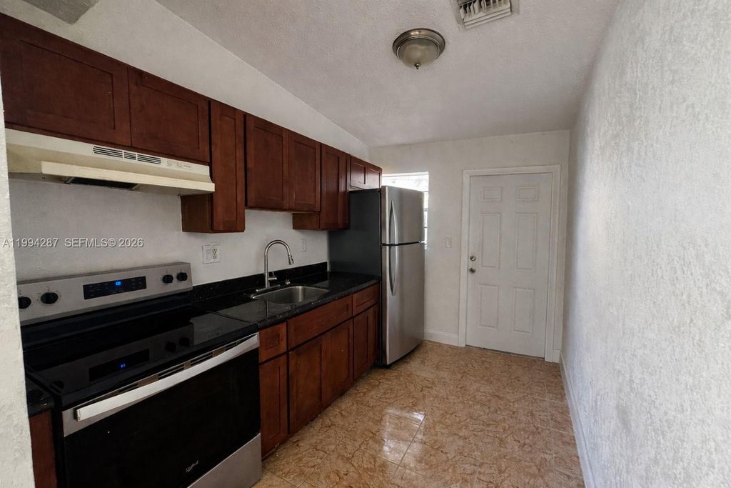 Photo of 1950 Washington Ave #2, Opa Locka, FL 33054 (MLS # A11994287)