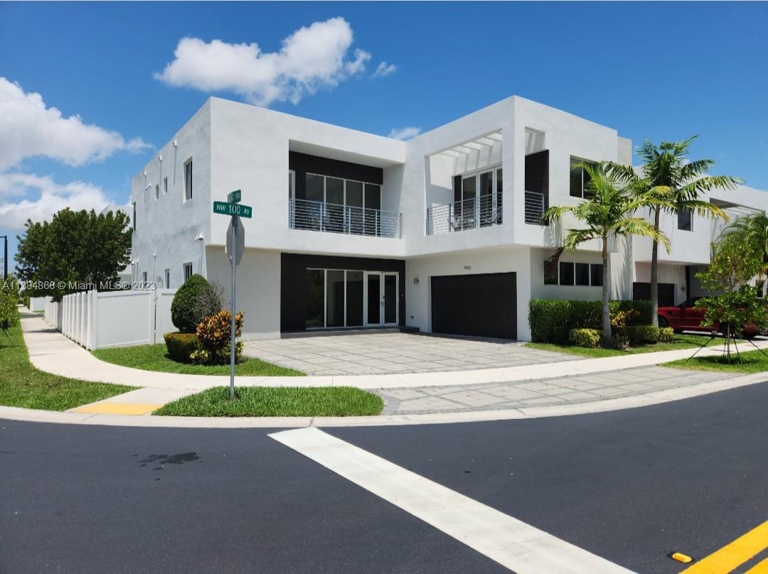 For sale beatiful 5 bed 5 bath CORNER Home in the exclusive contemporary community Modern 60 in Doral. OPEN FLOOR plan, 1 bedroom & 1 bath on the first floor and elegant interior, high ceiling, impact window & doors, Porcelanato floors on 1st floor and Wood Floors on 2nd floor and stairs, white kitchen cabinets, quartz counter tops and top of the line Stainless Steel appliances, Pergola with BUILTIN BBQ. Club house with meeting areas, a fully equipped fitness center and children's playroom, media room and kitchenette, swimming pool, spa, gazebo area and more. Association includes basic cable & internet, security patrol and front landscaping.