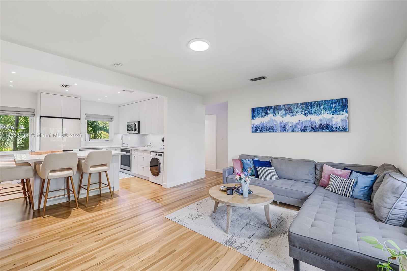 Located within South Miami's most sought-after community of High Pines, is this beautifully renovated 2 bedroom, 1 bath apartment in a boutique-style building, surrounded by lush landscaping in a family-friendly neighborhood. The tastefully designed unit has lots of natural light and open concept main living area, ideal for hosting. Kitchen features state-of-the-art appliances, sleek cabinetry, wine cooler, and plenty of storage space. The meticulously designed bathroom evokes serenity and a warm atmosphere. Washer/Dryer in unit, impact windows, window treatments & hardwood floors. The complex has a pool, easy parking, and laundry facility. Property is a short distance from Downtown South Miami, Whole Foods, CVS, Publix, shops, dining, University of Miami, Metrorail, and A+ rated schools.